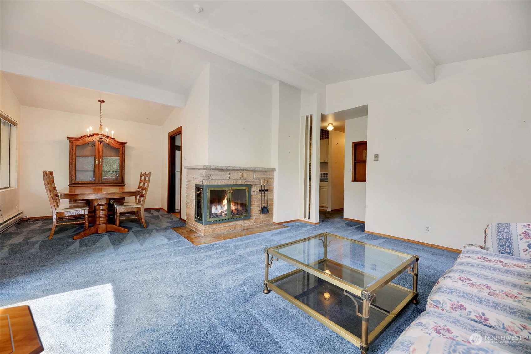 225 76th Street Southwest Everett, WA 98203 - Photo 12 of 26 a living room with furniture and a fireplace