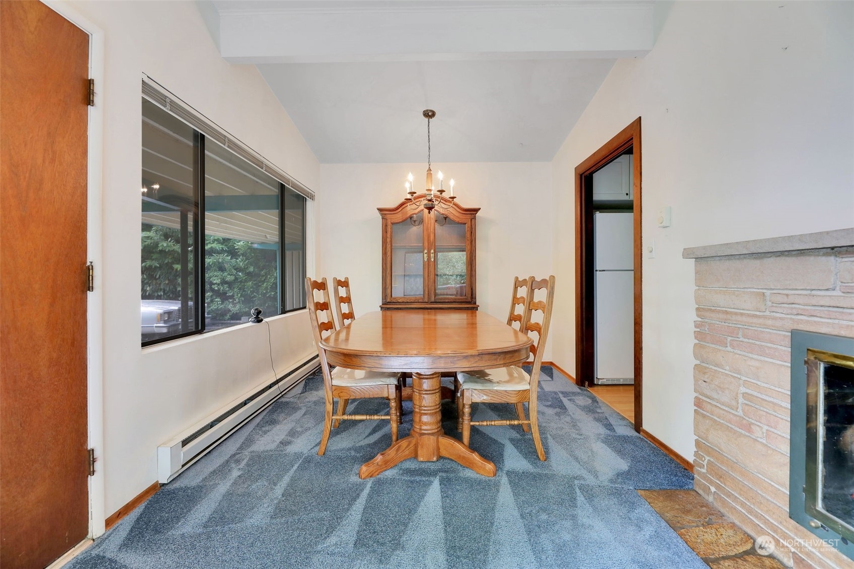 225 76th Street Southwest Everett, WA 98203 - Photo 9 of 26 a dining room with furniture window and wooden floor