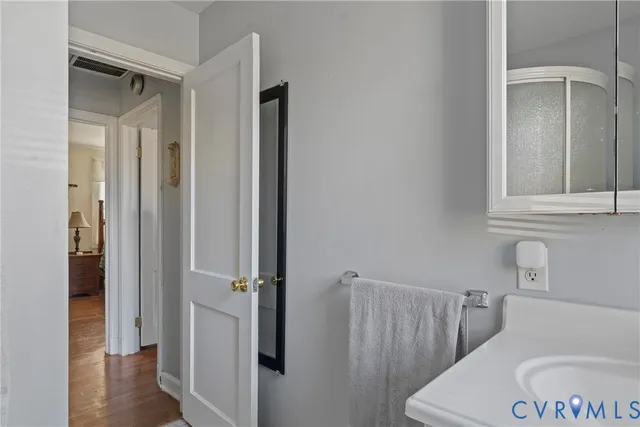 a bathroom with a toilet and a sink