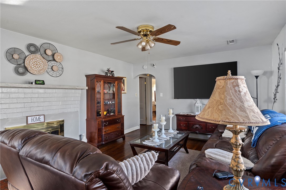 1408 Boroughbridge Road Richmond, VA 23225 - Photo 7 of 31 a living room with furniture and wooden floor