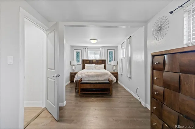 a bedroom with a bed and a cabinets
