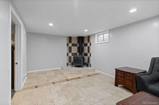 a view of a livingroom with furniture and storage