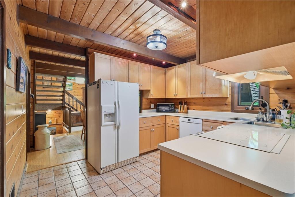 6110 Saltsburg Road Murrysville, PA 15668 - Photo 9 of 47 a kitchen with a refrigerator a stove and a sink