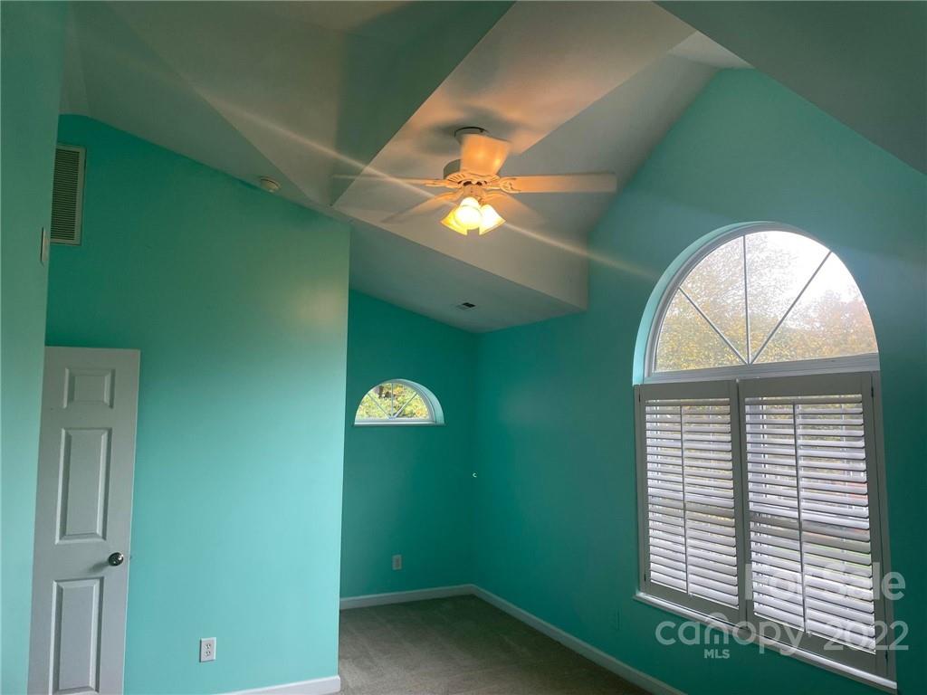 1014 Briarcliff Road Mooresville, NC 28115 - Photo 16 of 27 a view of empty room with fan and window