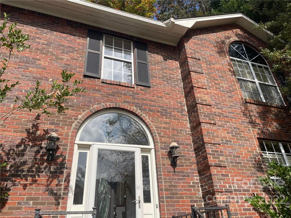 1014 Briarcliff Road Mooresville, NC 28115 - Photo 3 of 27 a front view of a house with glass windows