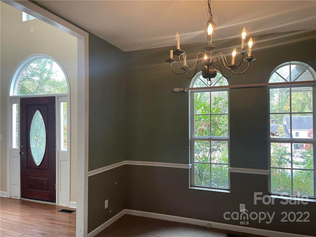 1014 Briarcliff Road Mooresville, NC 28115 - Photo 10 of 27 a front view of a house with wooden floor and a window
