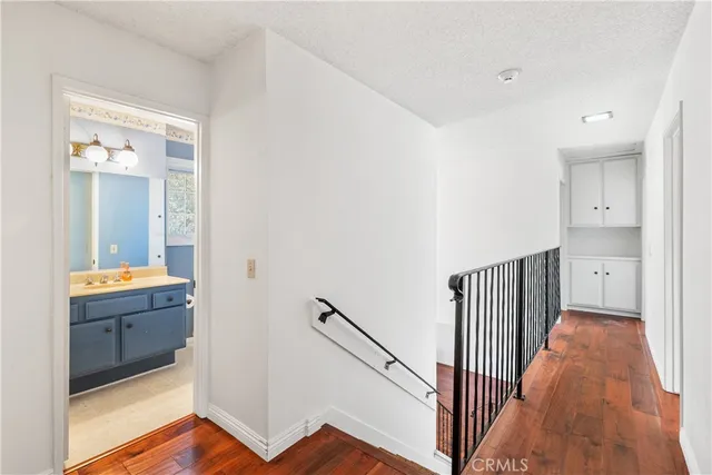 a view of a bathroom from the hallway