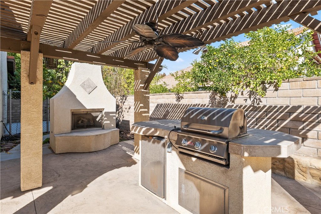 1421 Magnolia Avenue Redlands, CA 92373 - Photo 30 of 46 Outdoor gas grill w/island & fireplace