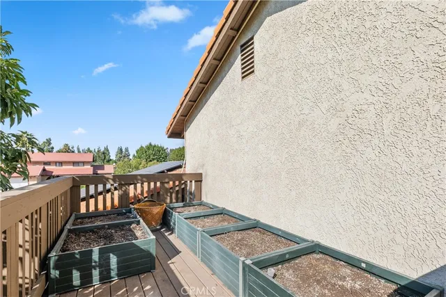 a view of a backyard with a tree