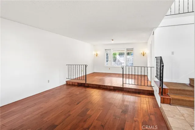 a view of livingroom with hardwood floor and window