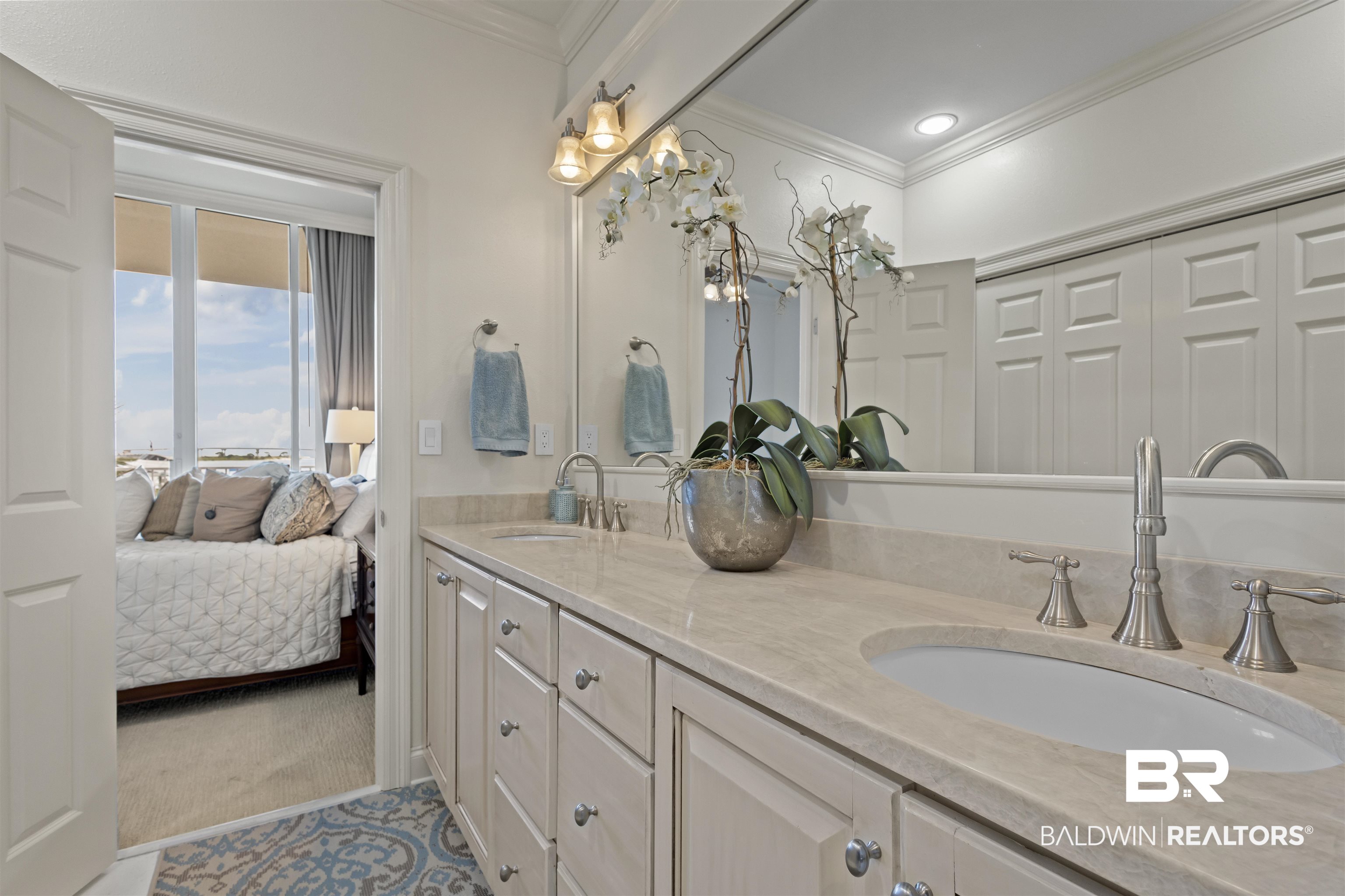 27800 Canal Road, Unit 120 Orange Beach, AL 36561 - Photo 21 of 68 Bathroom featuring tile patterned floors, vanity, and ornamental molding