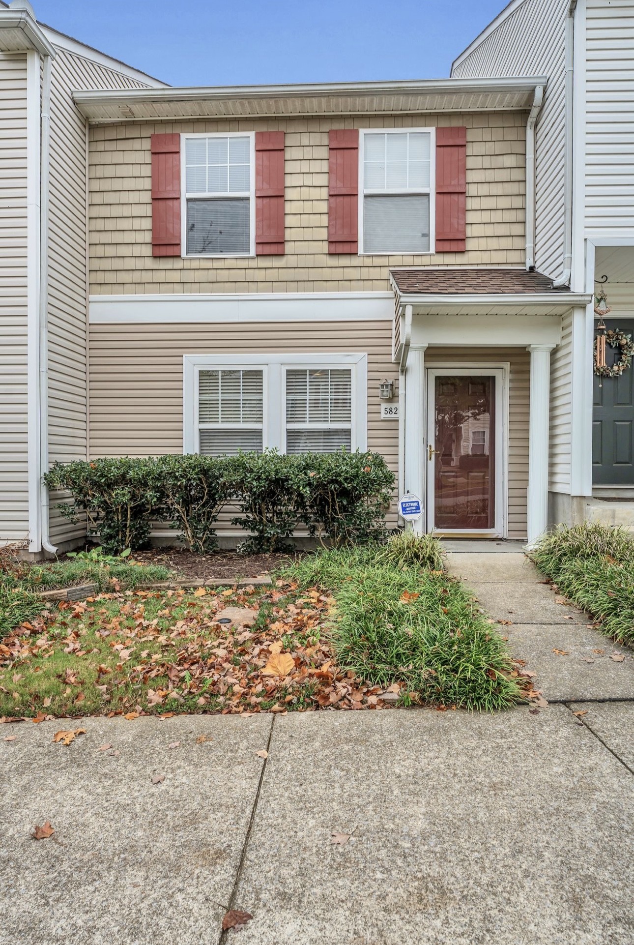 Undisclosed Address Antioch, TN 37013 - Photo 2 of 18 a front view of a house with garden