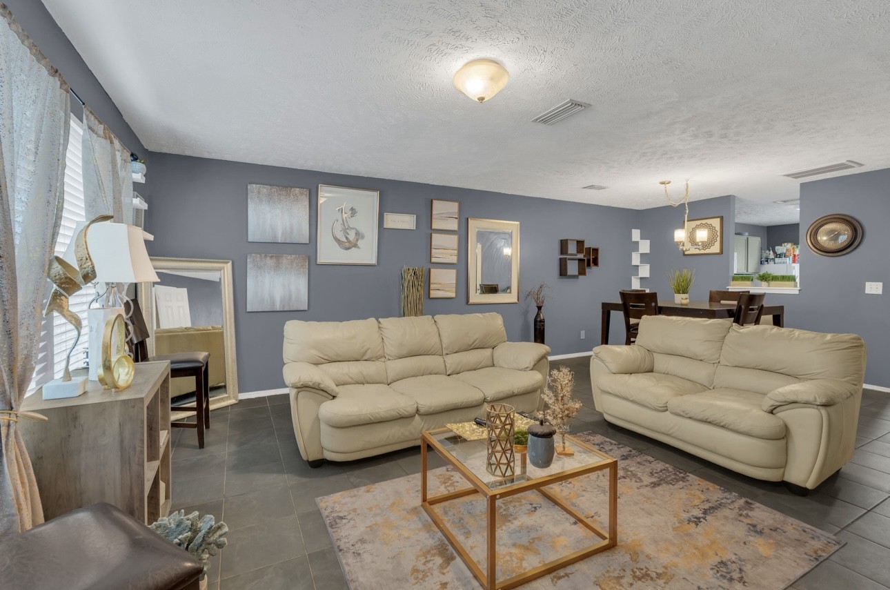 Undisclosed Address Antioch, TN 37013 - Photo 5 of 18 a living room with furniture and a table