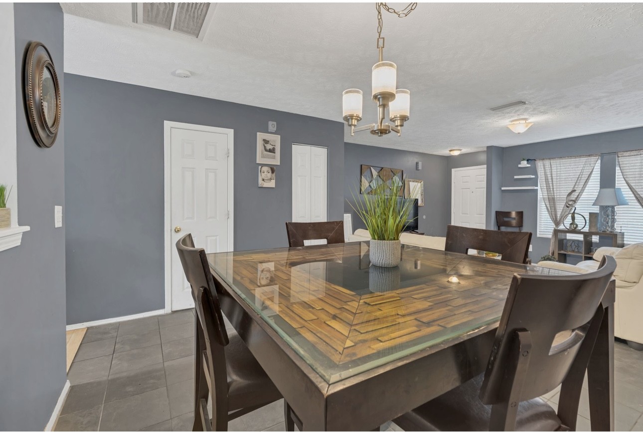 Undisclosed Address Antioch, TN 37013 - Photo 8 of 18 a view of a dining room with furniture