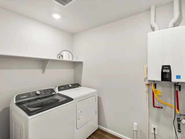 a utility room with dryer and washer