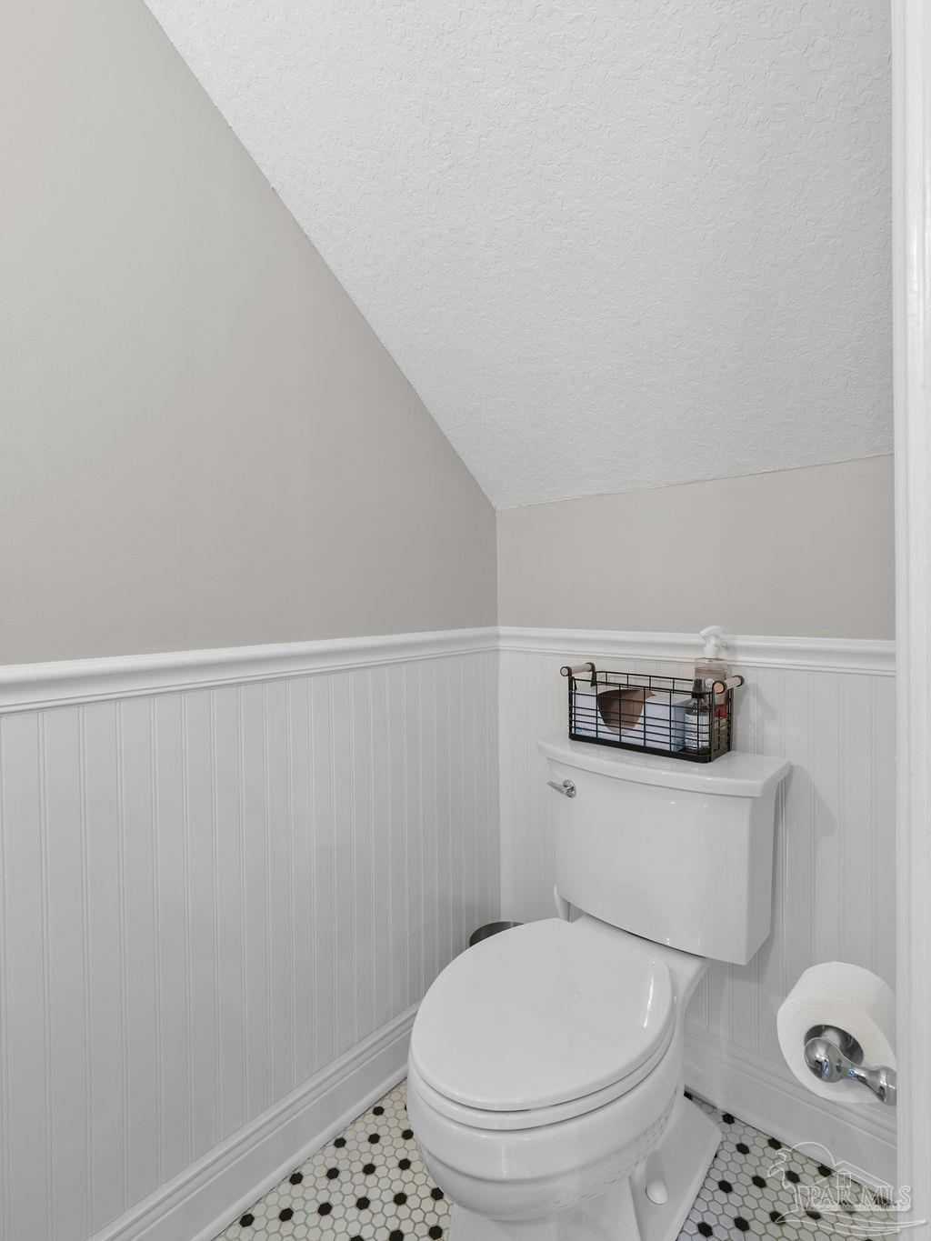 10152 Bittern Drive Pensacola, FL 32507 - Photo 14 of 45 a white toilet sitting next to a small sink