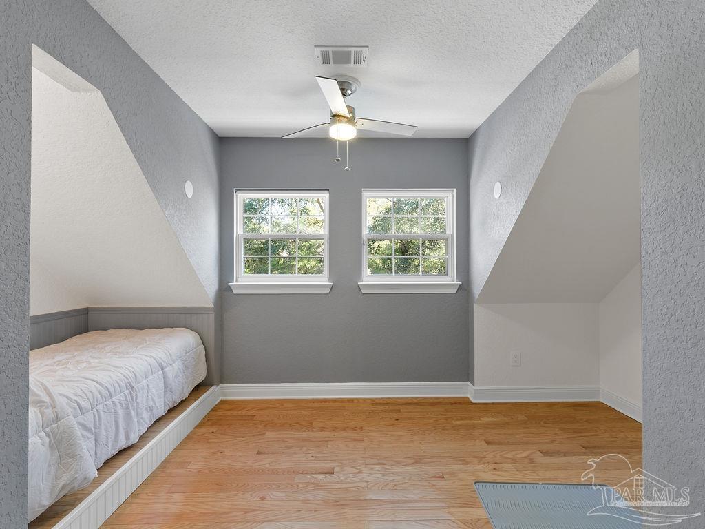 10152 Bittern Drive Pensacola, FL 32507 - Photo 26 of 45 a bedroom with a bed and window