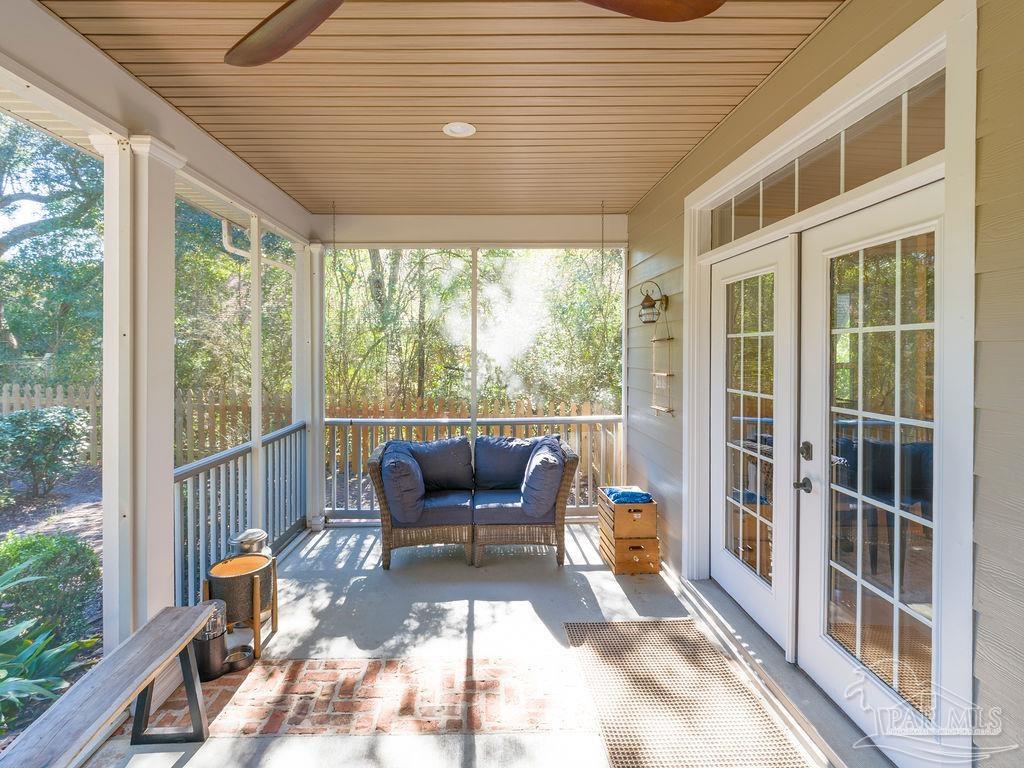 10152 Bittern Drive Pensacola, FL 32507 - Photo 29 of 45 a balcony with furniture and outdoor view