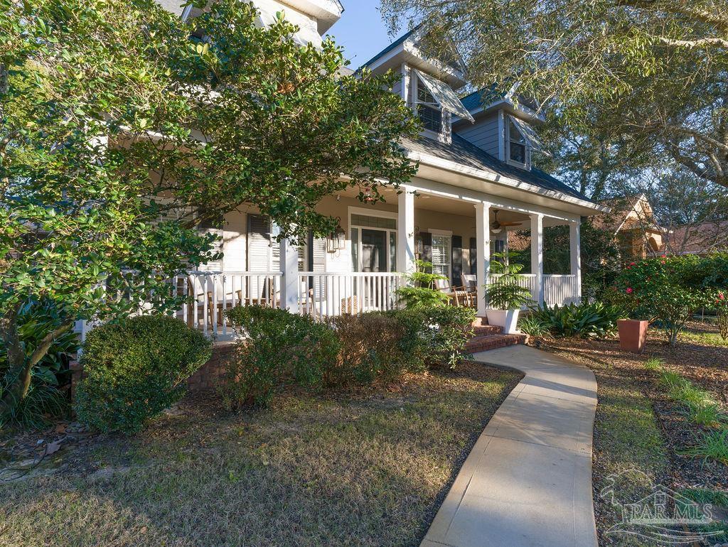 10152 Bittern Drive Pensacola, FL 32507 - Photo 38 of 45 a front view of a house with yard and green space