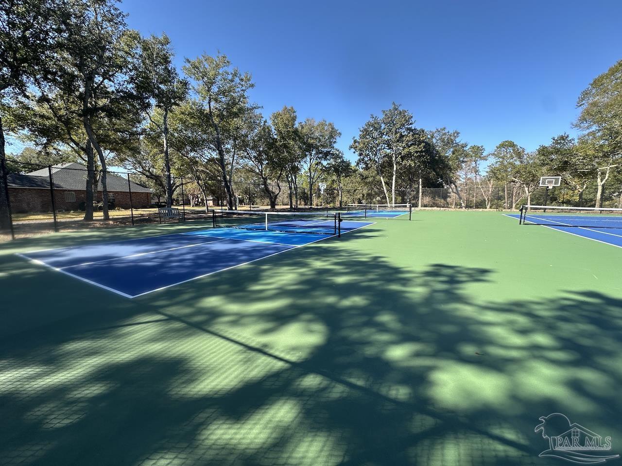 10152 Bittern Drive Pensacola, FL 32507 - Photo 39 of 45 a view of a golf course with trees