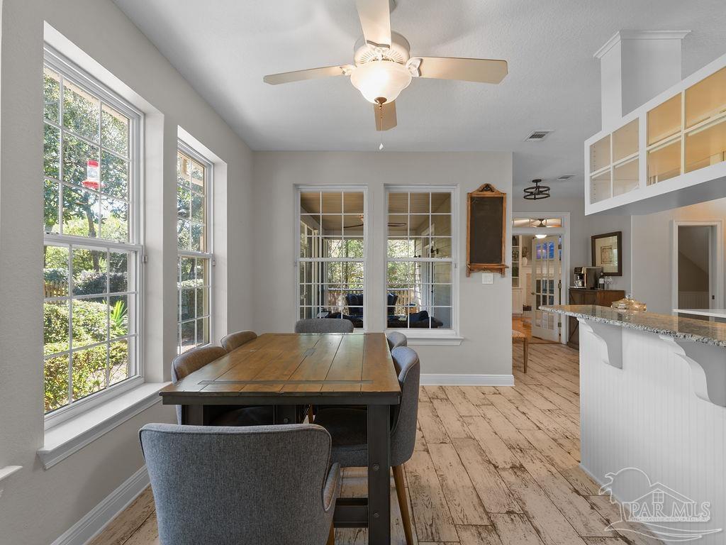 10152 Bittern Drive Pensacola, FL 32507 - Photo 7 of 45 a living room with furniture and large windows