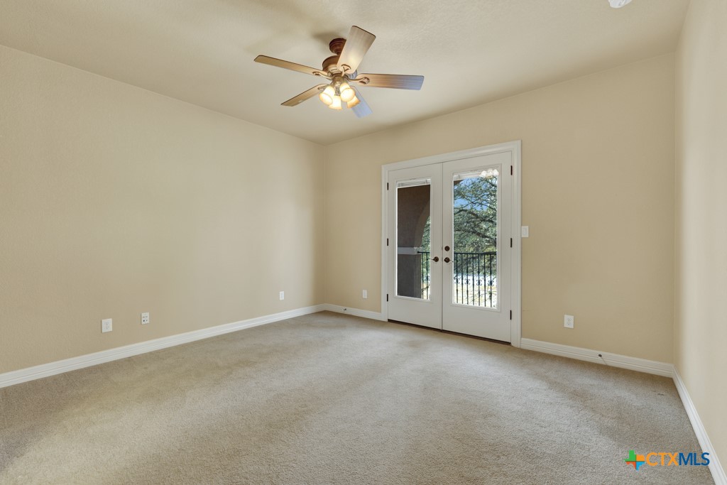 7607 Sky Loop Garden Ridge, TX 78266 - Photo 35 of 43 a view of an empty room with a window