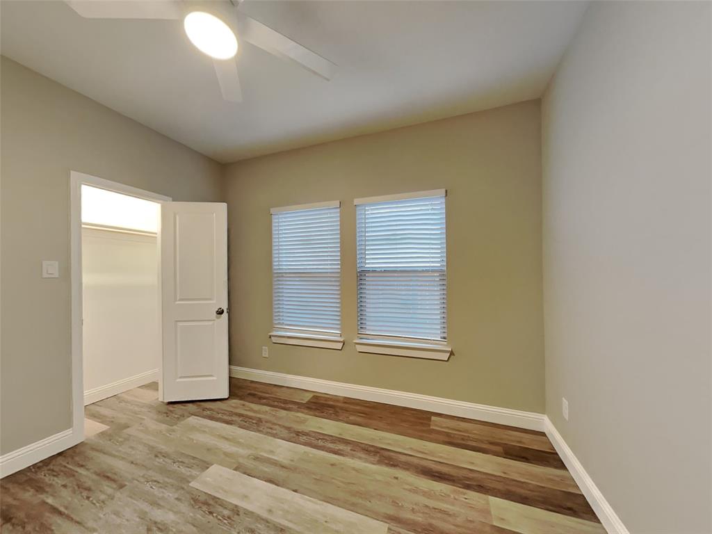 2512 Sharon Street Dallas, TX 75211 - Photo 14 of 17 an empty room with window