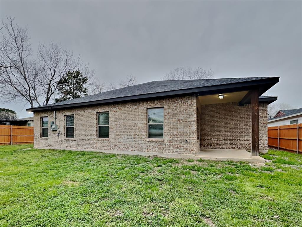 2512 Sharon Street Dallas, TX 75211 - Photo 17 of 17 a front view of house with yard