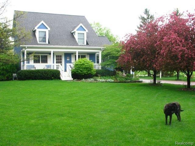 140 North Baldwin Road Oxford, MI 48371 - Photo 1 of 7 True Cape Cod