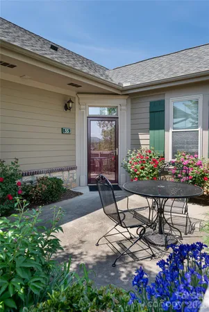 a view of a table and chairs in patio
