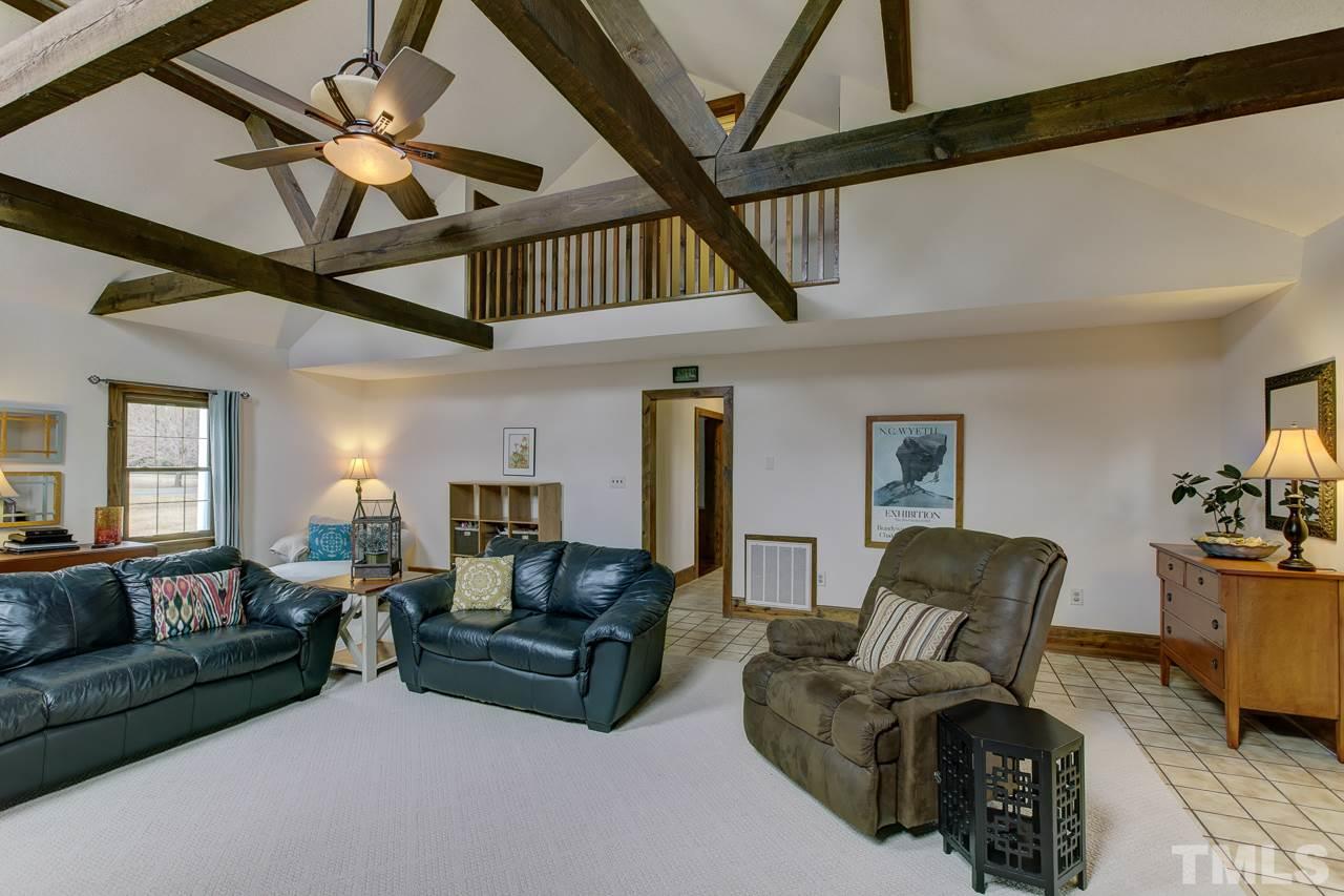 7850 James Austin Road Willow Spring, NC 27592 - Photo 14 of 25 a living room with furniture