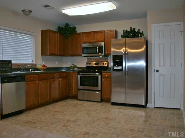 6009 Ladish Lane Raleigh, NC 27610 - Photo 3 of 21 Wow, what a huge kitchen, so open & spacious, new stainless appliances with bonus FREE SS side by side Fridge. Lots of cabinets and pantry storage! New paint and new flooring!