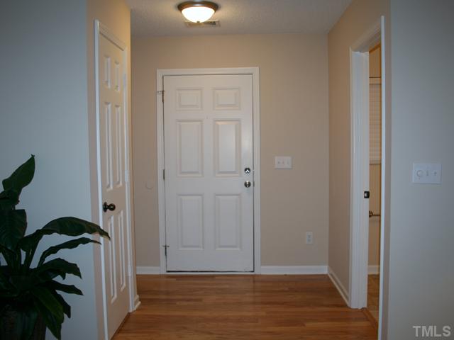 6009 Ladish Lane Raleigh, NC 27610 - Photo 9 of 21 A welcoming foyer with new hardwood flooring.