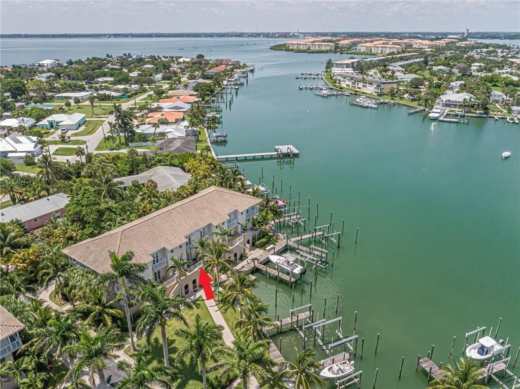 1564 Island Cove Road, Unit 1564 Fort Pierce, FL 34949 - Photo 5 of 26 an aerial view of a house with a lake view
