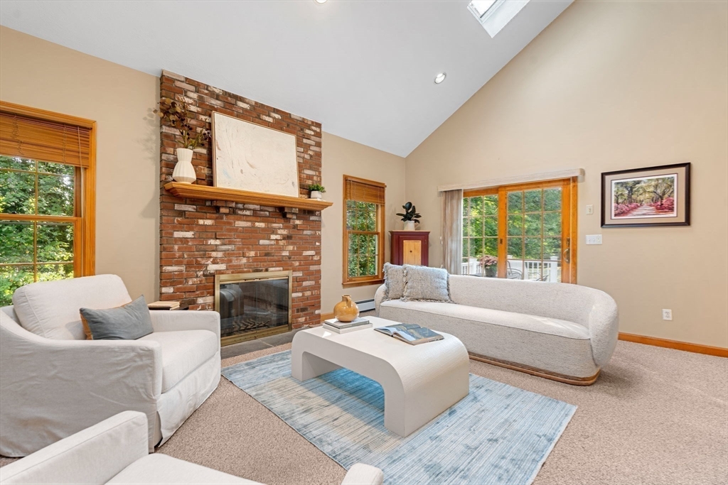 35 Lynn Road Needham, MA 02494 - Photo 14 of 38 a living room with fireplace furniture and a large window