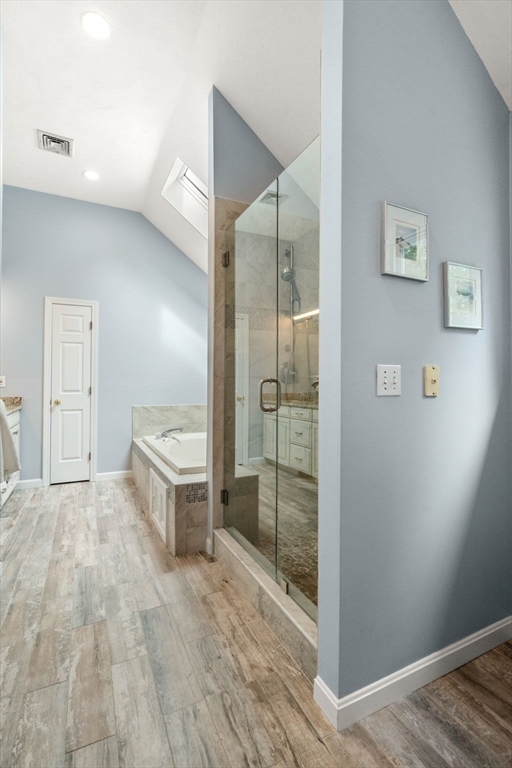 35 Lynn Road Needham, MA 02494 - Photo 20 of 38 a bathroom with a tub and shower