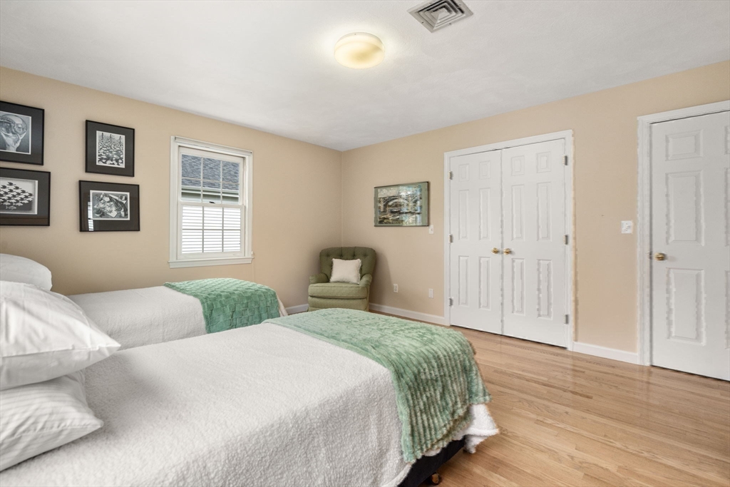 35 Lynn Road Needham, MA 02494 - Photo 22 of 38 a bedroom with a large bed and a window