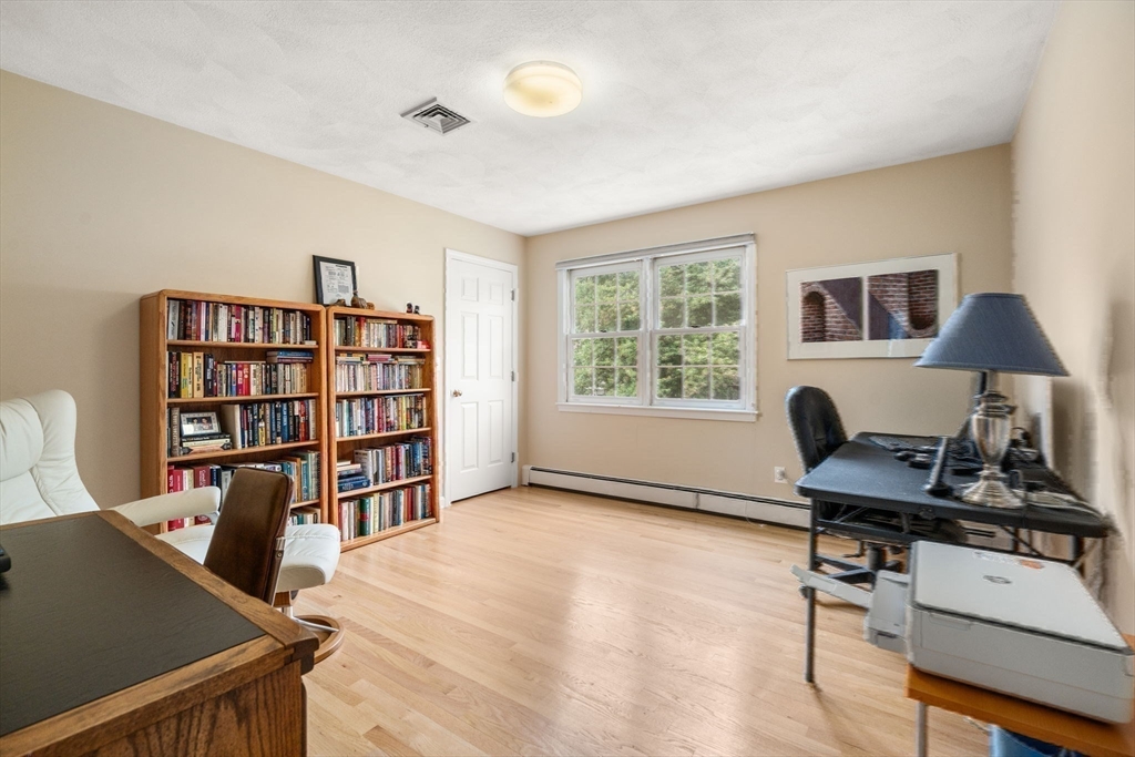 35 Lynn Road Needham, MA 02494 - Photo 26 of 38 a view of a workspace with furniture and a window