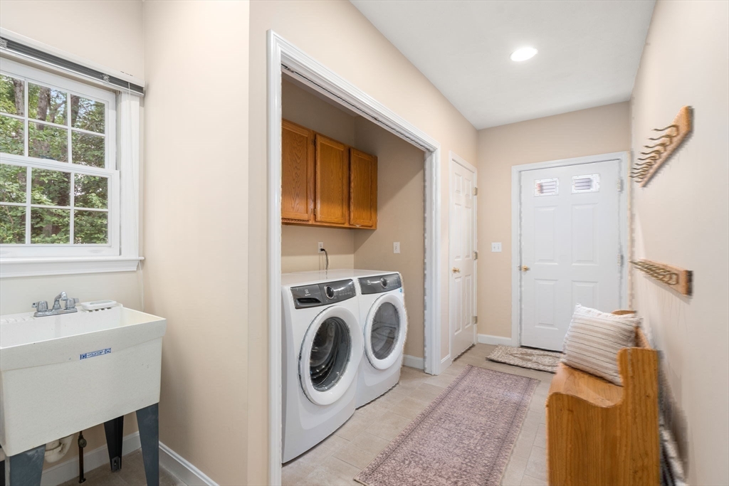 35 Lynn Road Needham, MA 02494 - Photo 30 of 38 a utility room with dryer and washer
