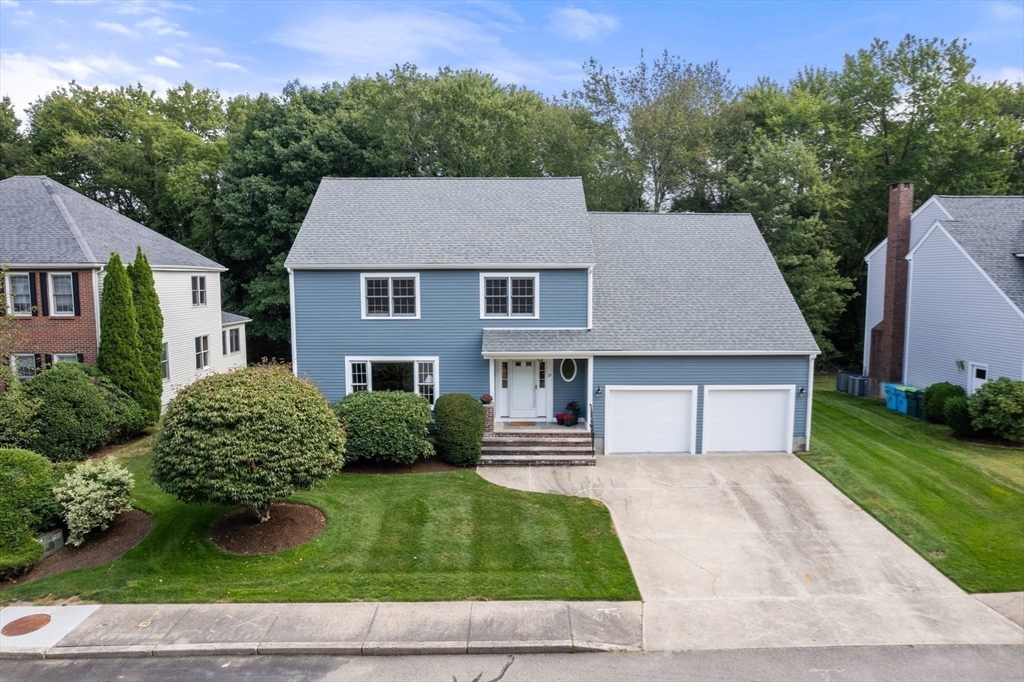 35 Lynn Road Needham, MA 02494 - Photo 38 of 38 front view of a house with a yard