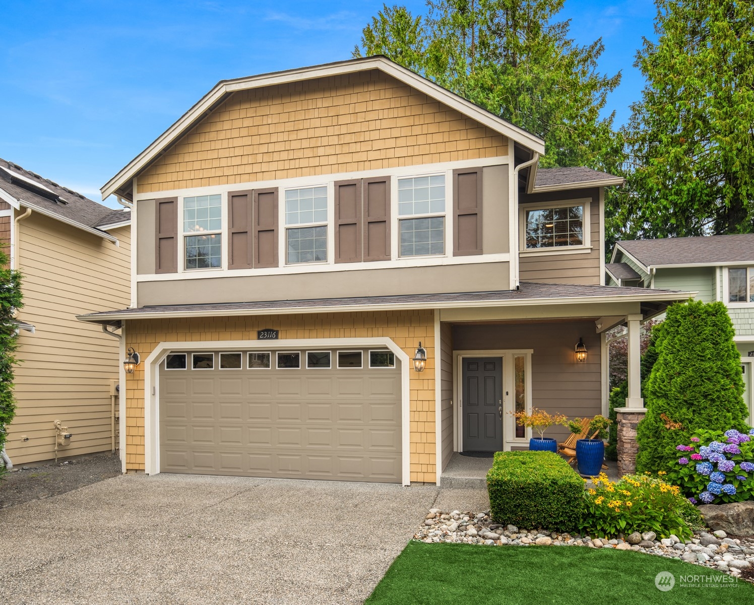 23116 87th Avenue West Edmonds, WA 98026 - Photo 1 of 27 a front view of a house with garden