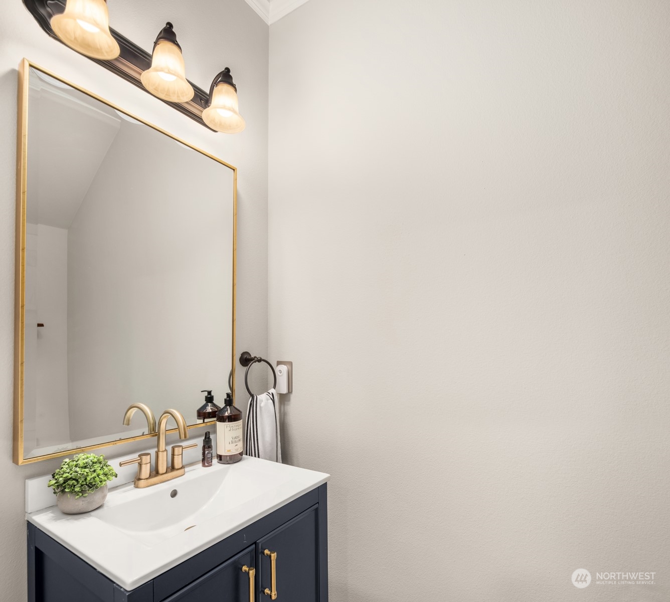 23116 87th Avenue West Edmonds, WA 98026 - Photo 12 of 27 a bathroom with a sink and a mirror