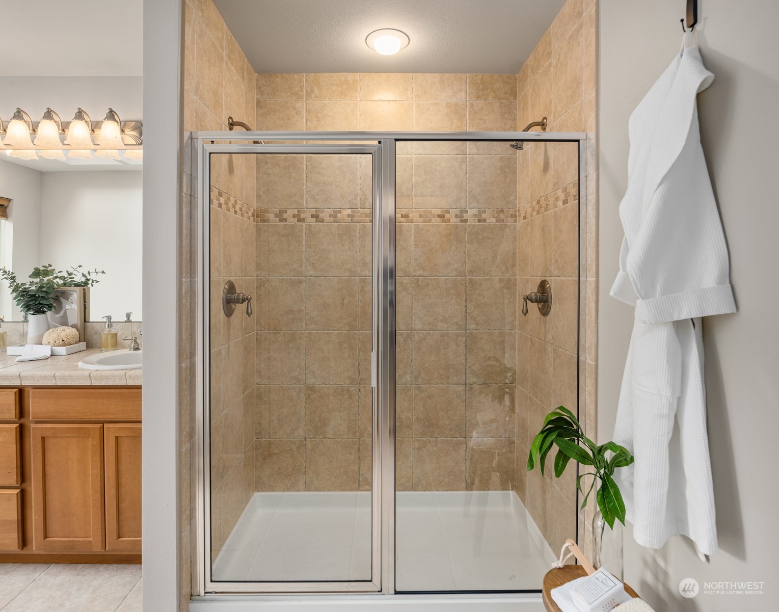 23116 87th Avenue West Edmonds, WA 98026 - Photo 16 of 27 a bathroom with a shower and a sink