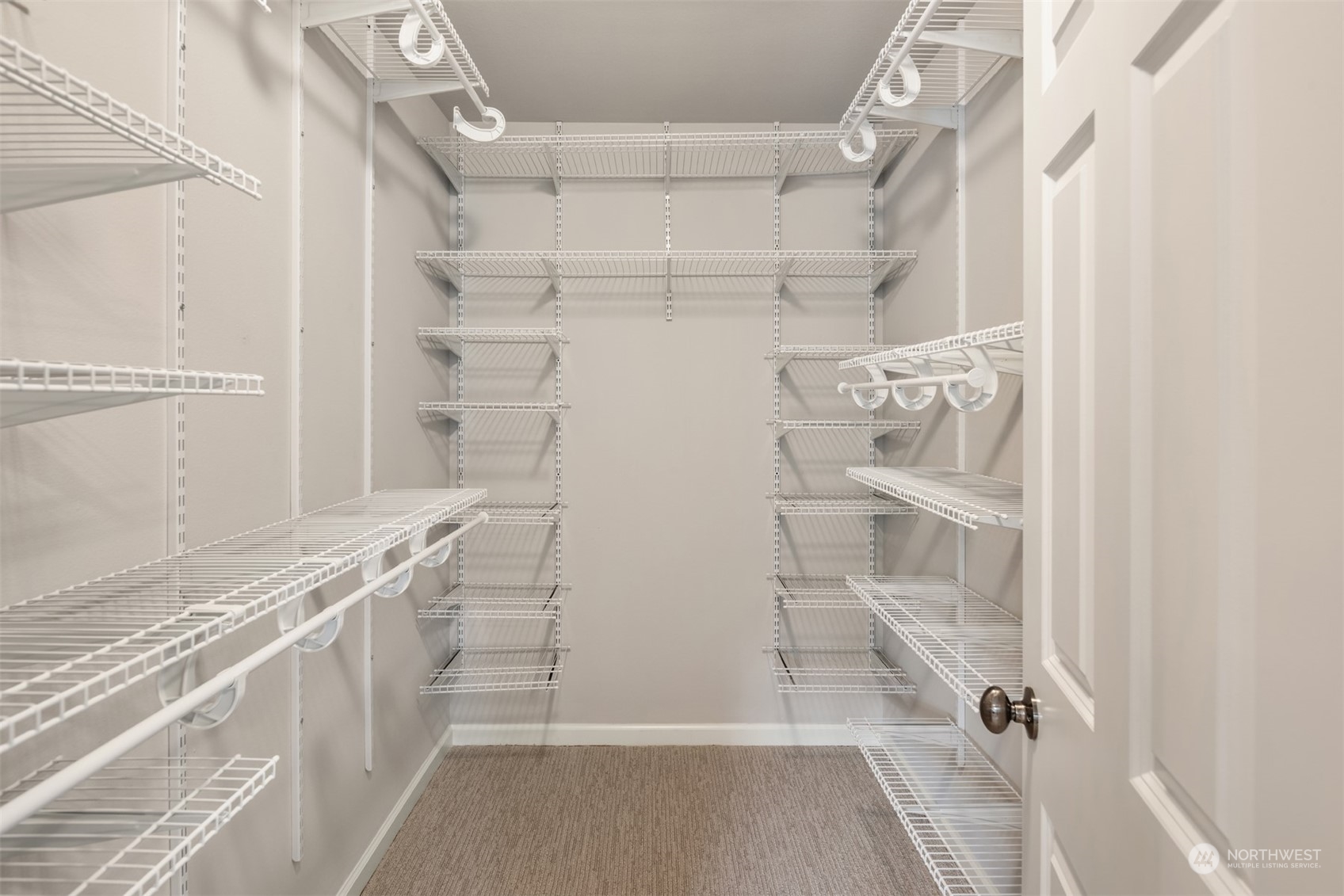 23116 87th Avenue West Edmonds, WA 98026 - Photo 17 of 27 a view of walk in closet with empty racks