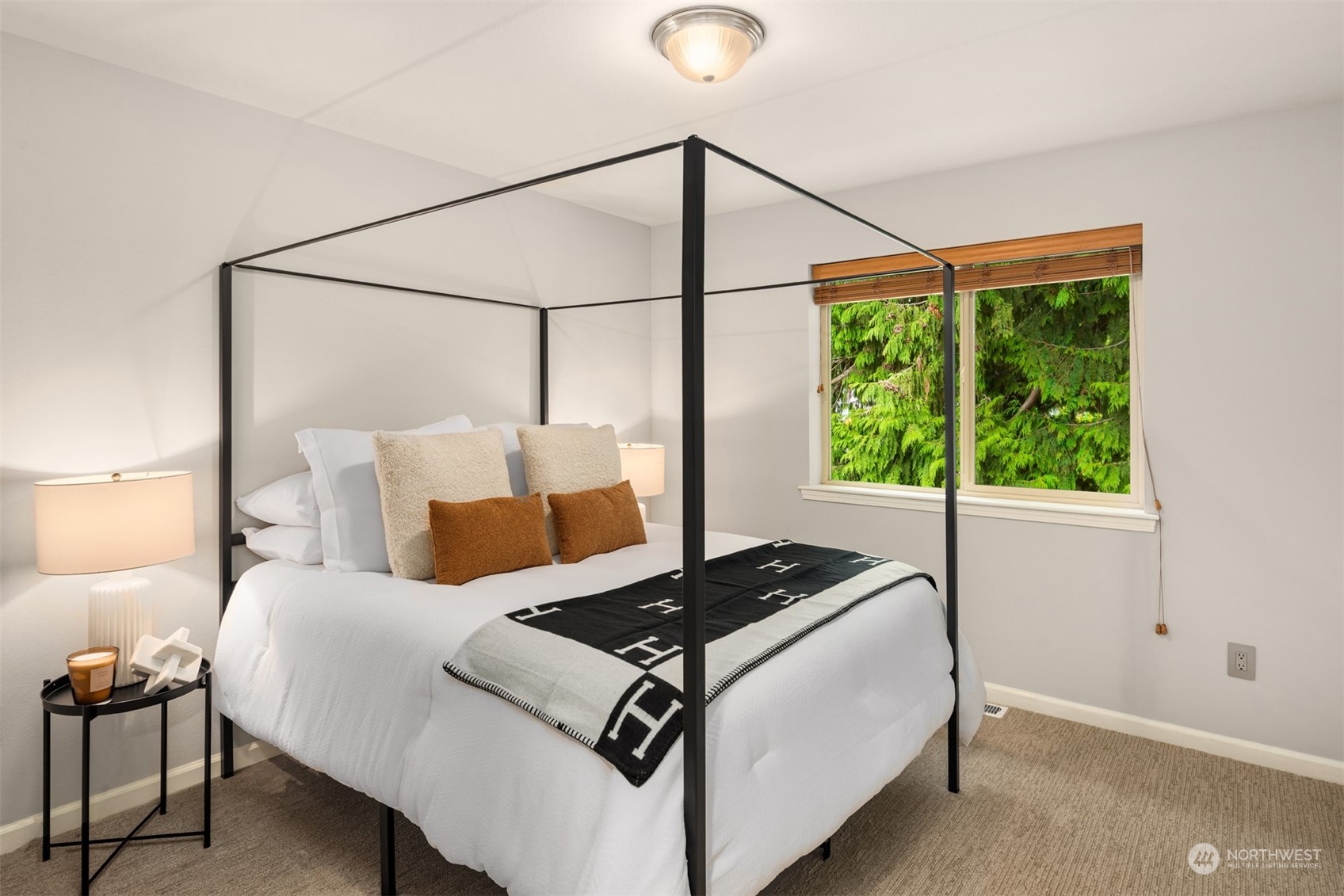 23116 87th Avenue West Edmonds, WA 98026 - Photo 18 of 27 a bedroom with a bed and a window