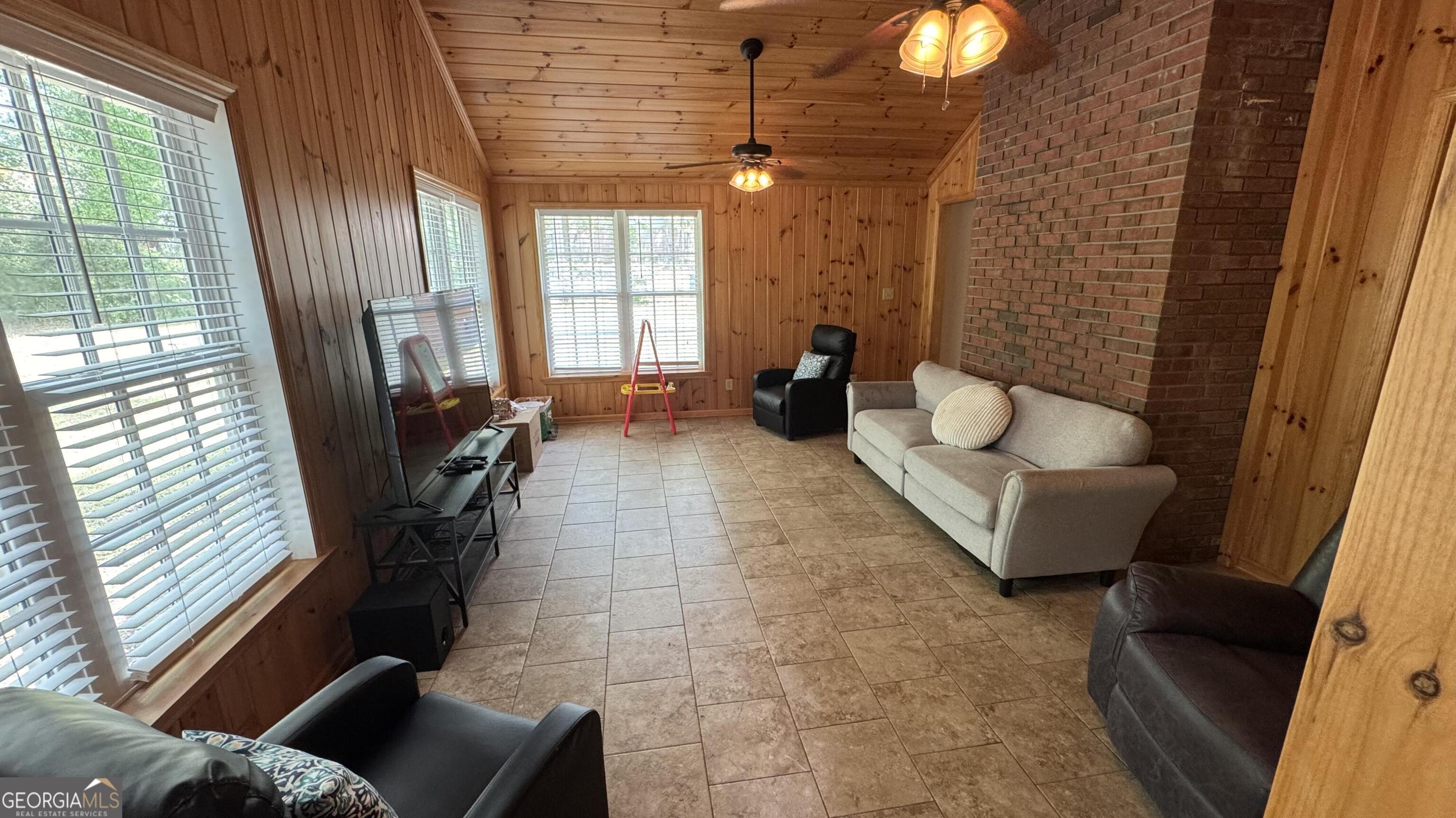355 Summer Hill Road Thomasville, GA 31757 - Photo 19 of 50 a living room with furniture and a window