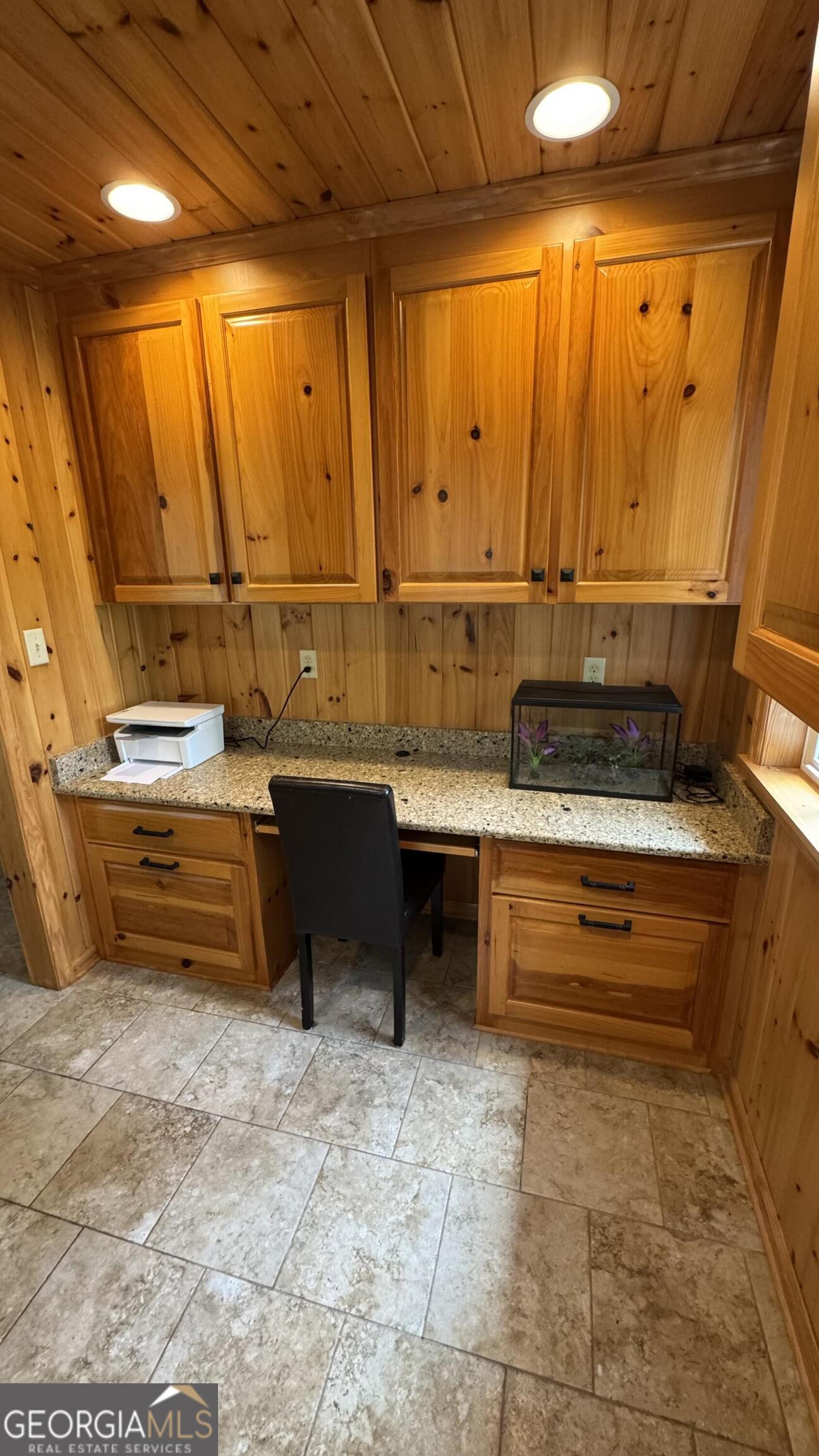 355 Summer Hill Road Thomasville, GA 31757 - Photo 24 of 50 a kitchen with a sink and cabinets