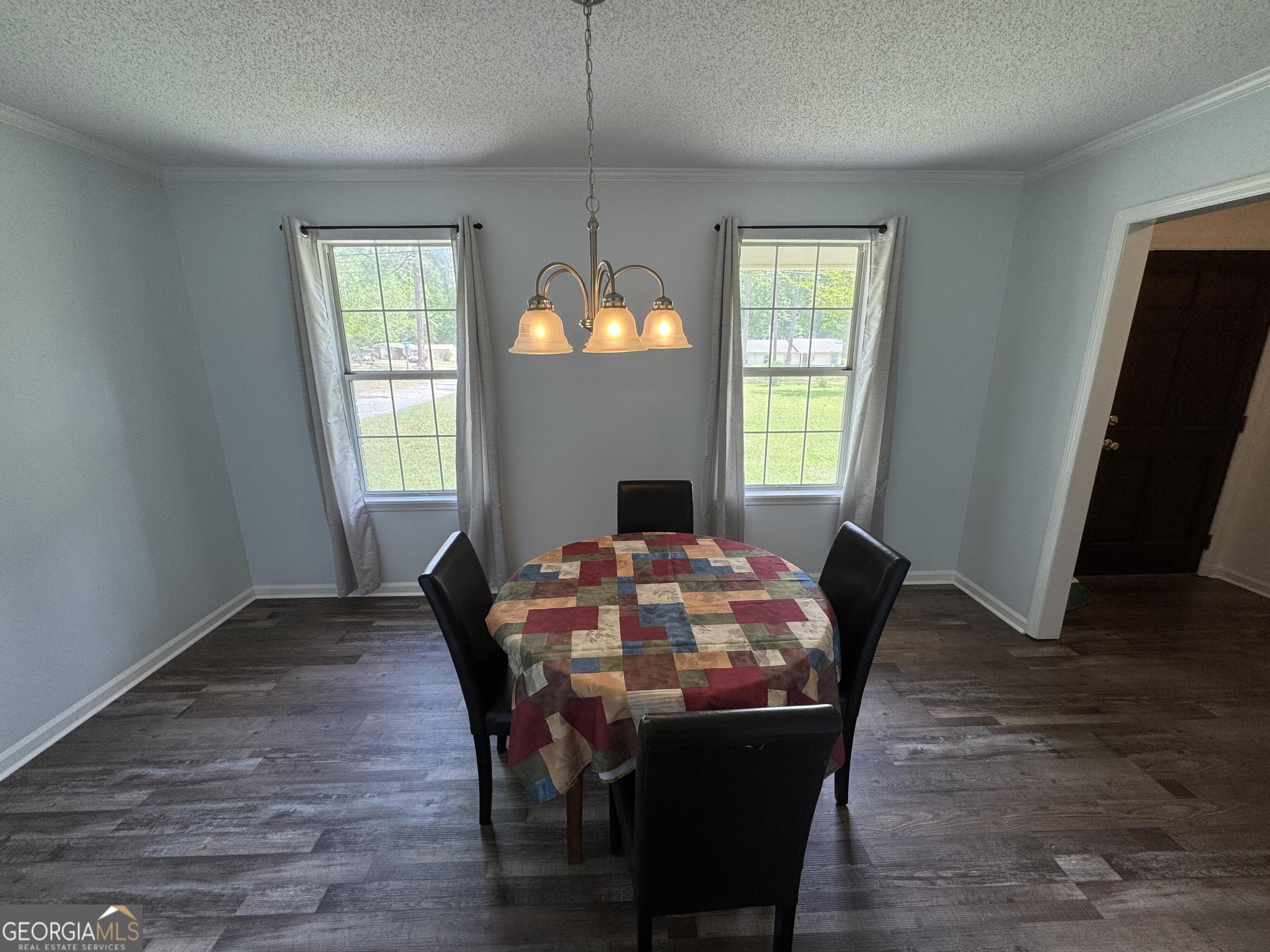 355 Summer Hill Road Thomasville, GA 31757 - Photo 29 of 50 a view of a dining room with furniture window and wooden floor