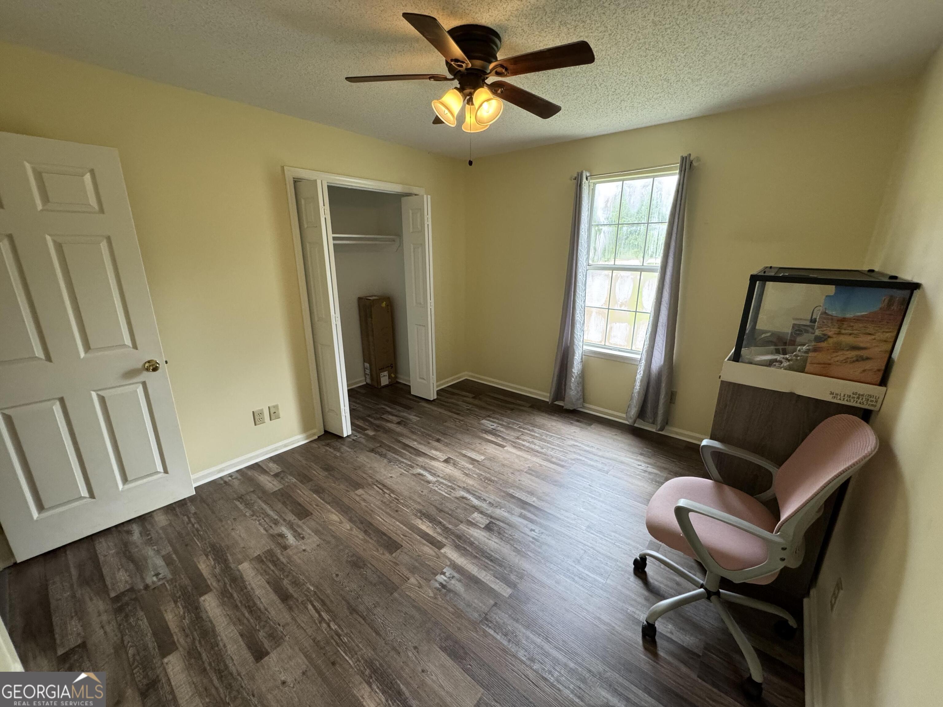 355 Summer Hill Road Thomasville, GA 31757 - Photo 34 of 50 a view of workspace with wooden floor windows