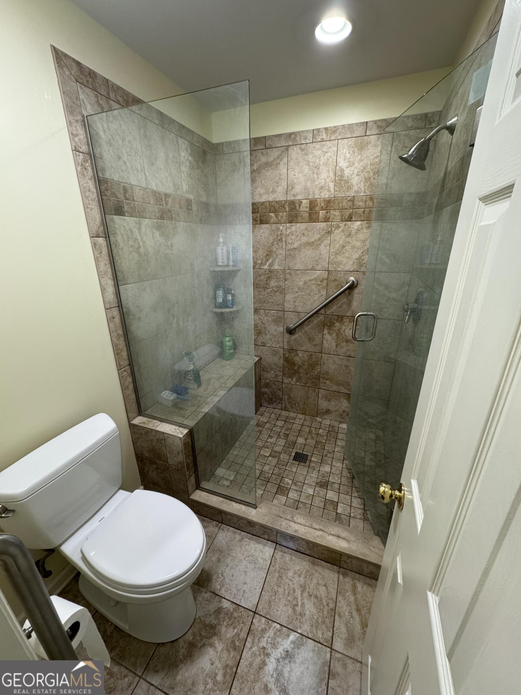 355 Summer Hill Road Thomasville, GA 31757 - Photo 45 of 50 a bathroom with a toilet and a shower